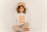 Model wearing kids brown teddy bucket hat 