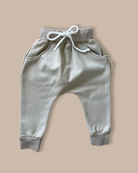 Baby/toddler/kids drop crotch joggers in a soft green colour and a Bobby G tag attached. 